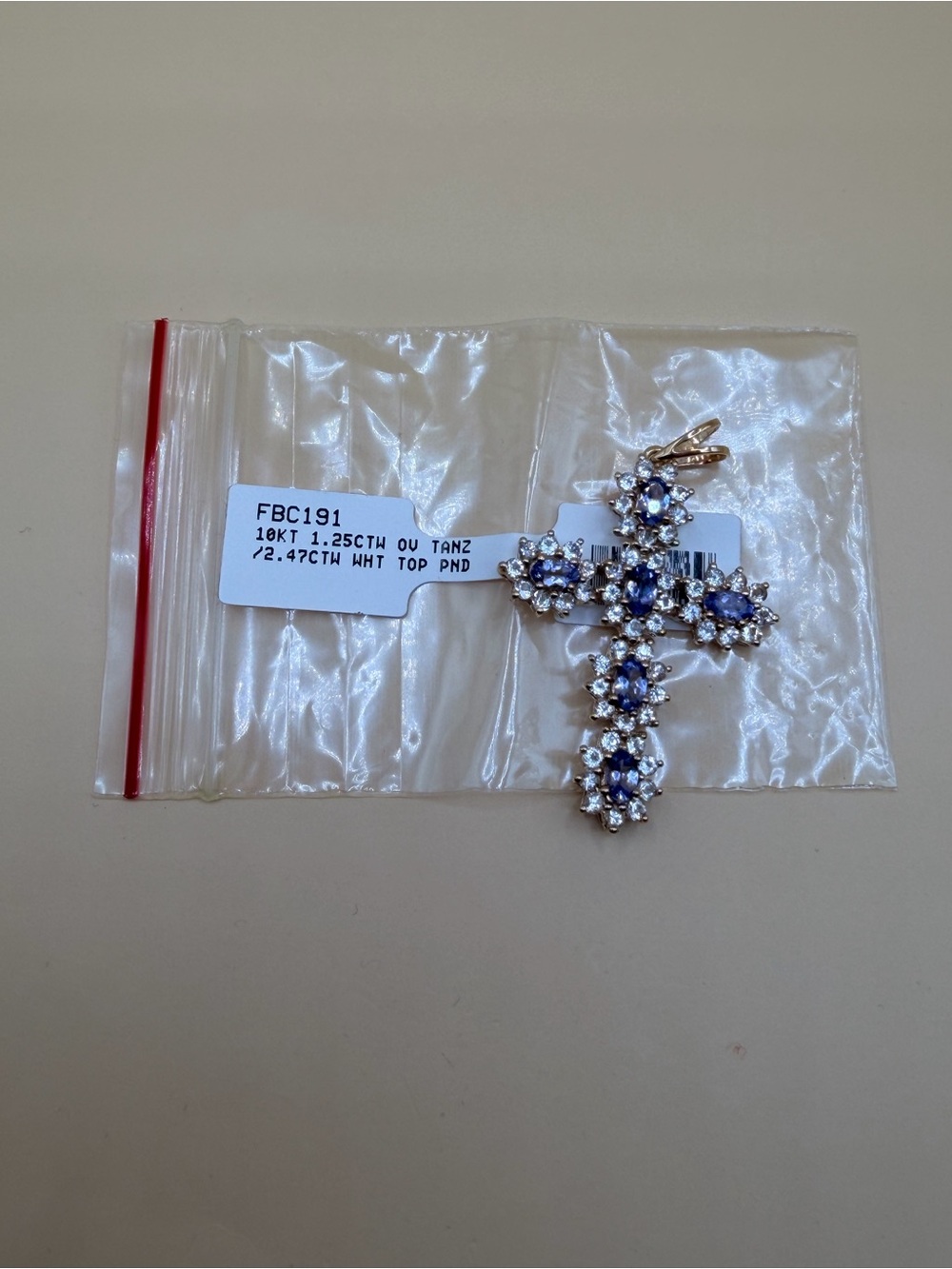 10k Yellow Gold 3.72 Ctw Tanzanite & Topaz Cross Pendant.